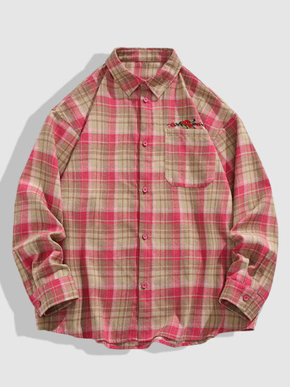 Casual men's plaid wool and cotton shirt with buttons and long sleeves