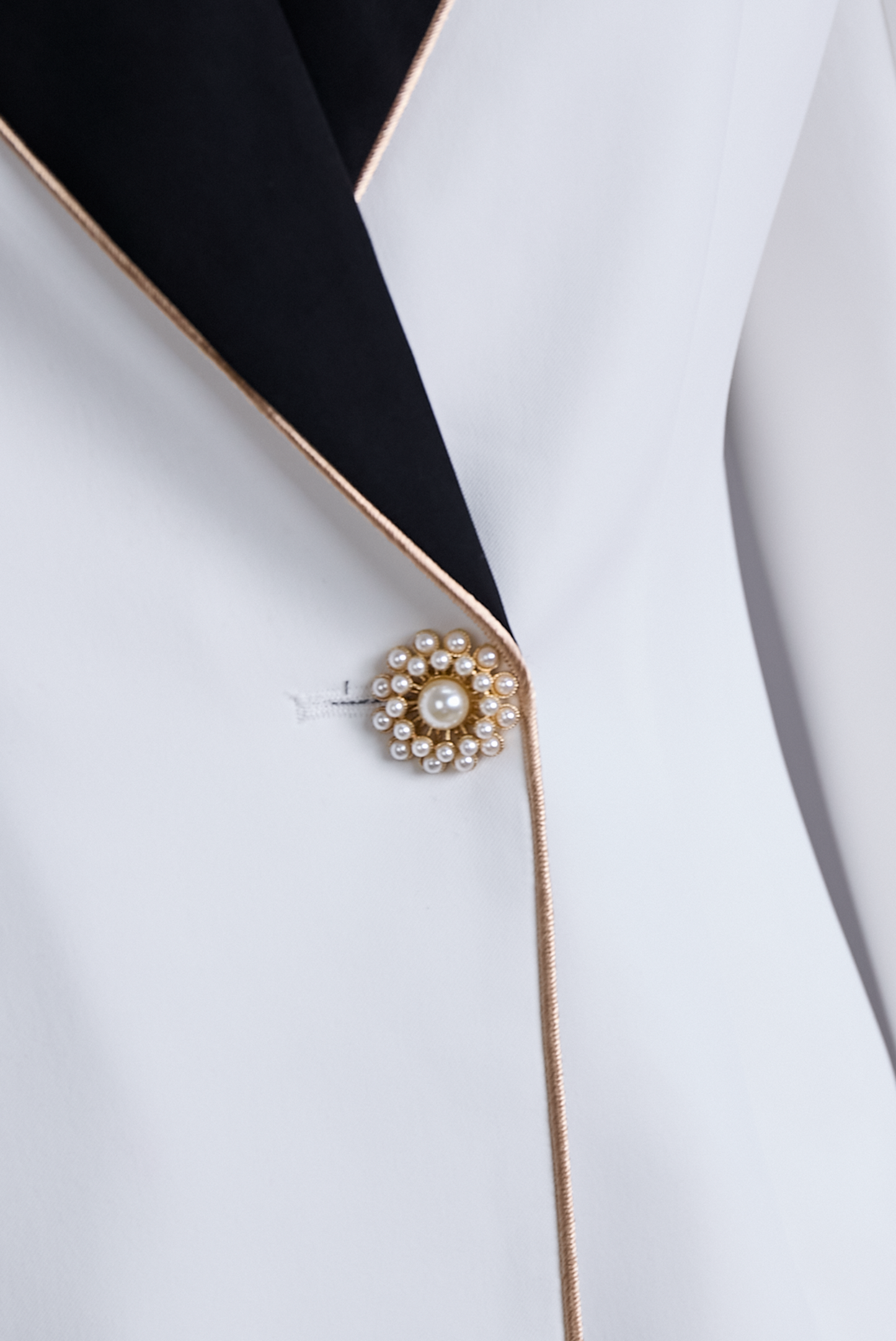 Elegant Asymmetrical White Blazer with Black Contrast Lapels