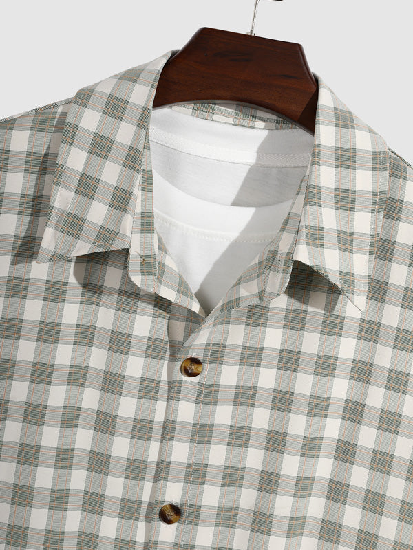 Classic plaid casual men's shirt with buttons and long sleeves