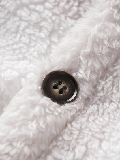 Classic men's plaid jacket with plush faux fur shoulder details, single pocket, buttons, and collar lapel