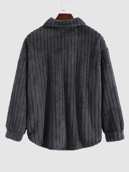 Classic men's plaid jacket with plush faux fur shoulder details, single pocket, buttons, and collar lapel