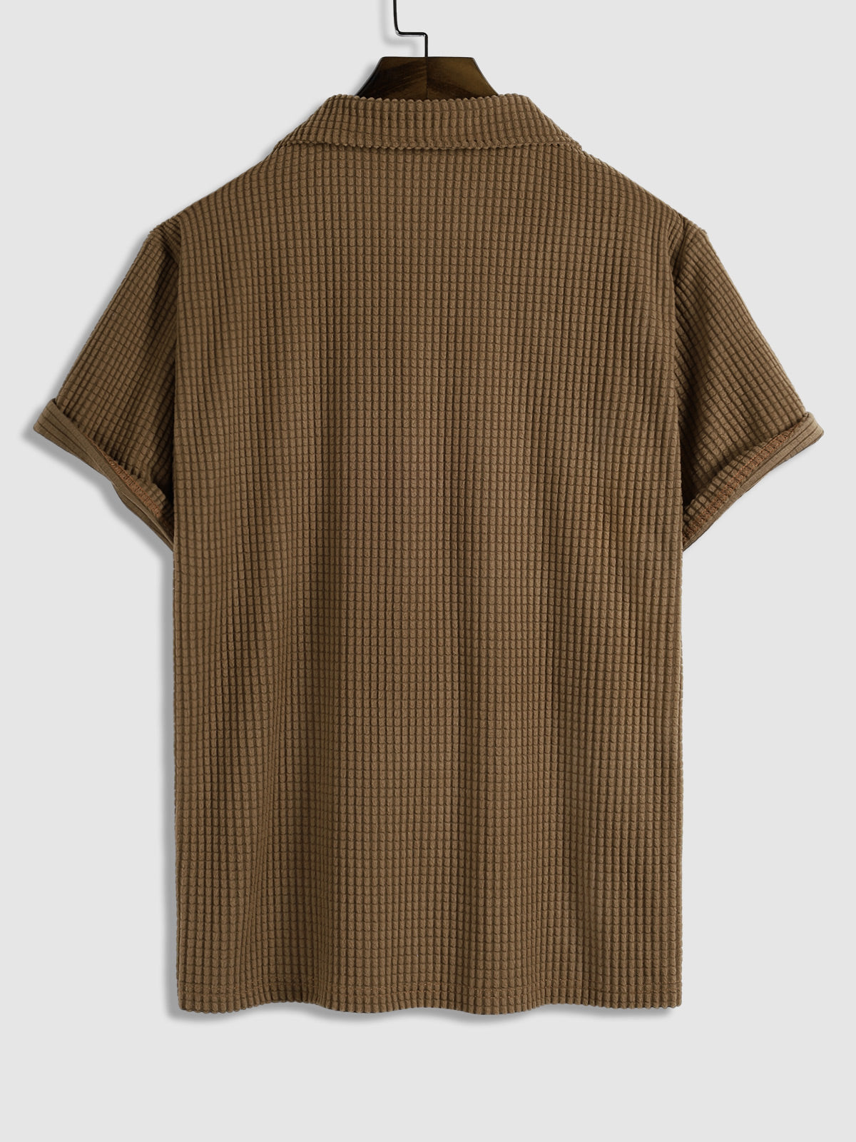 Men's polo shirt with a plain plaid pattern, textured collar, and short sleeves