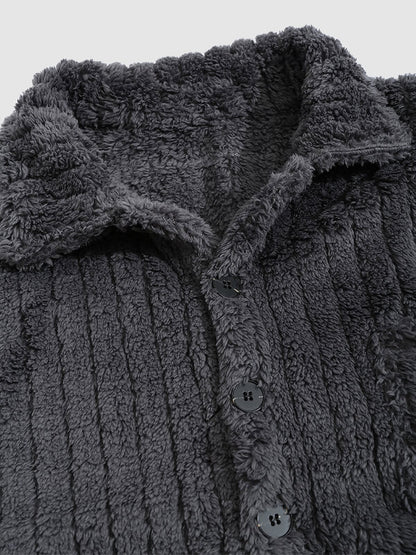 Classic men's plaid jacket with plush faux fur shoulder details, single pocket, buttons, and collar lapel