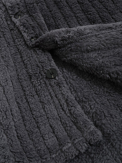 Classic men's plaid jacket with plush faux fur shoulder details, single pocket, buttons, and collar lapel