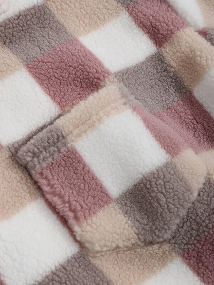 Classic men's plaid jacket with plush faux fur shoulder details, single pocket, buttons, and collar lapel