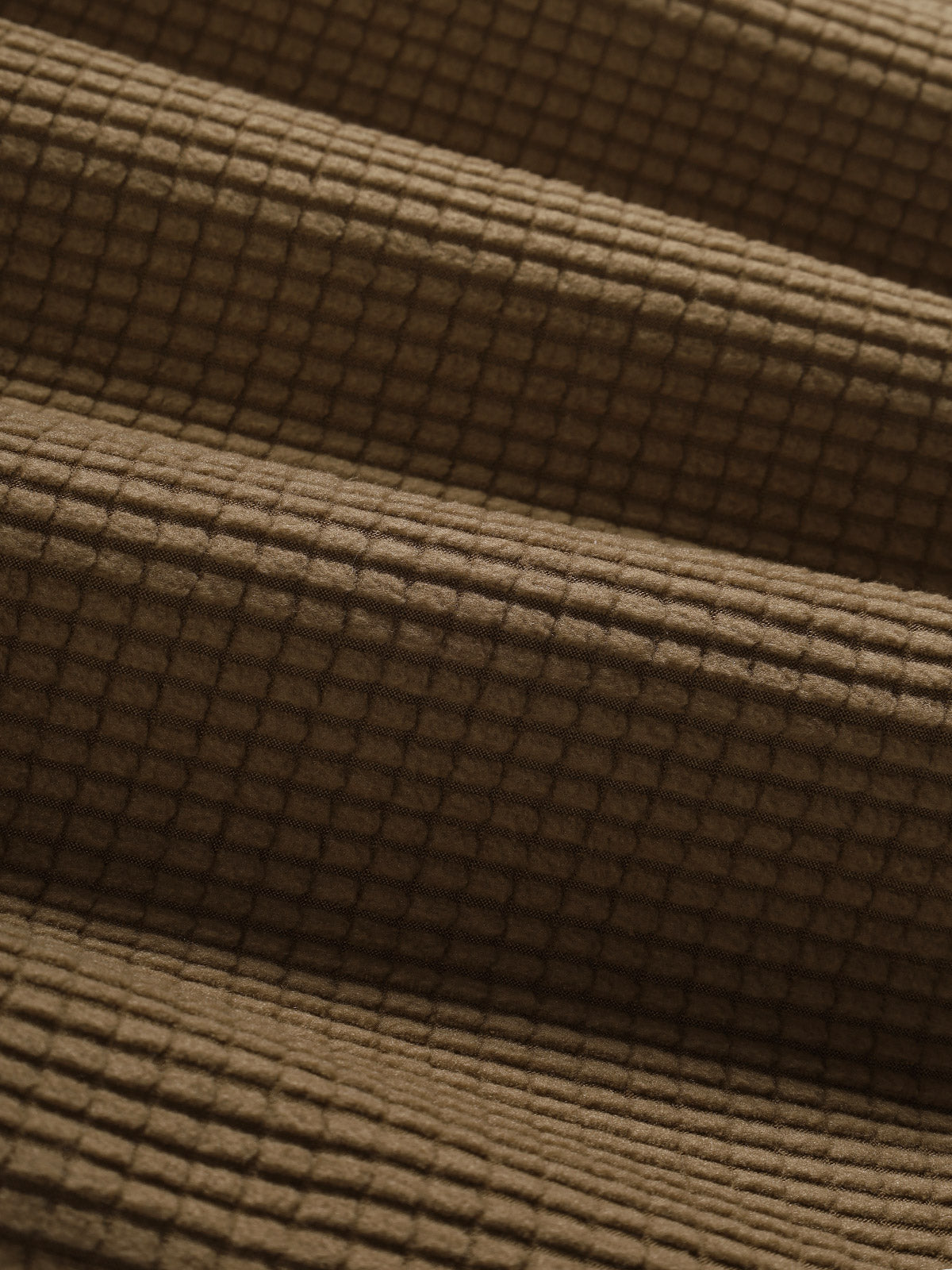 Men's polo shirt with a plain plaid pattern, textured collar, and short sleeves