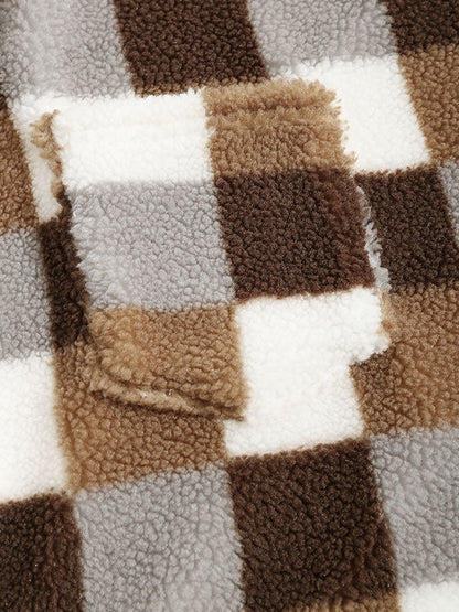 Classic men's plaid jacket with plush faux fur shoulder details, single pocket, buttons, and collar lapel