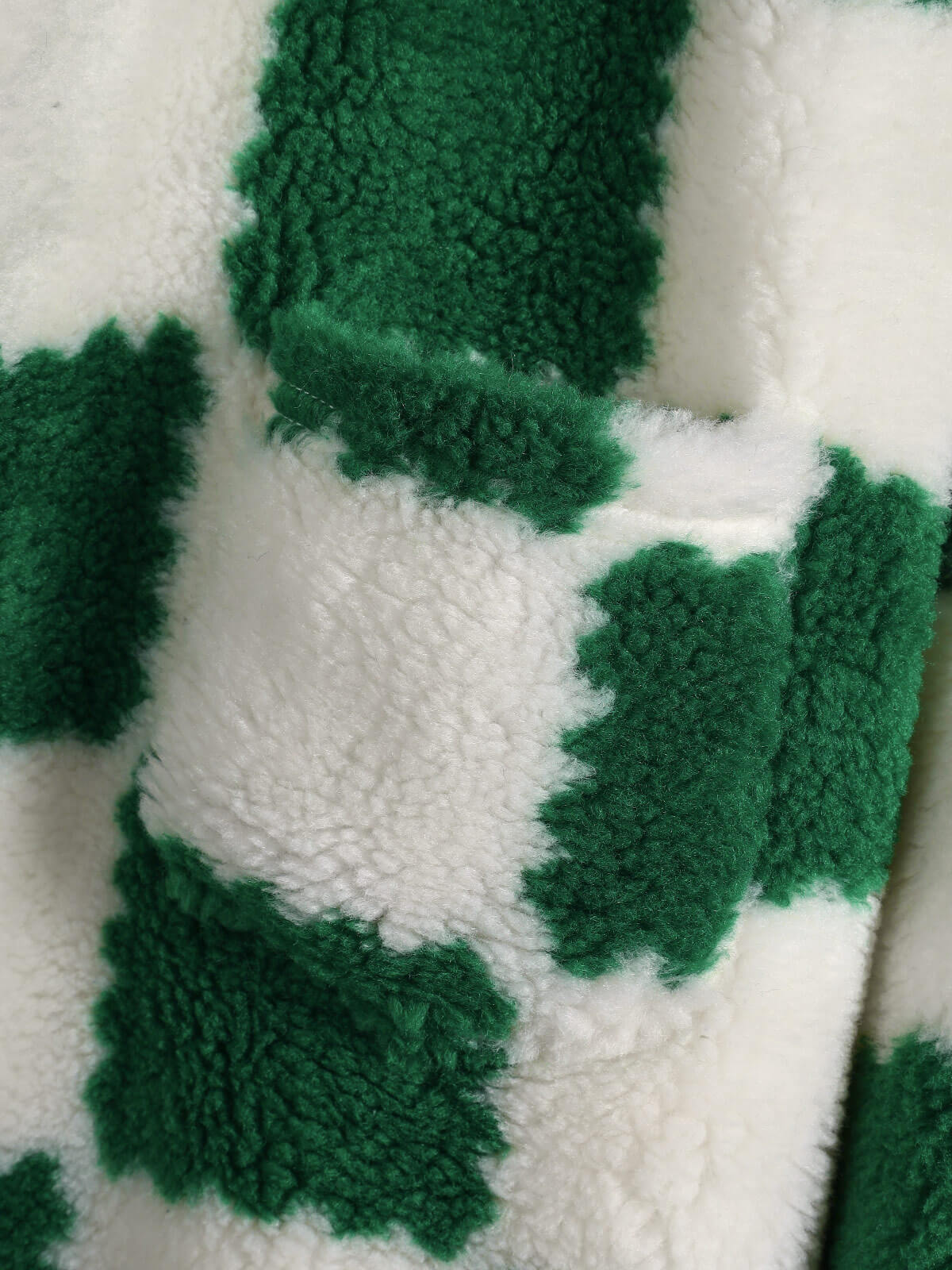 Men's faux fur plaid jacket with a single pocket and zipper for a casual and trendy style