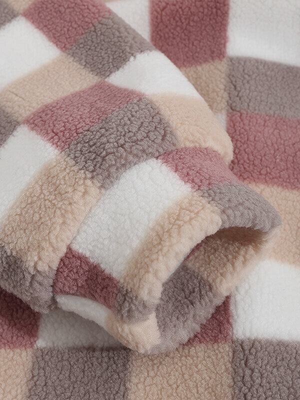 Classic men's plaid jacket with plush faux fur shoulder details, single pocket, buttons, and collar lapel