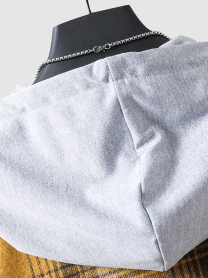 Men's quilted fleece vest with plaid pattern and hood with drawstring